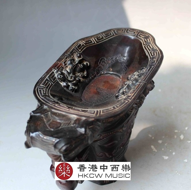 精雕瑞獸牛角杯